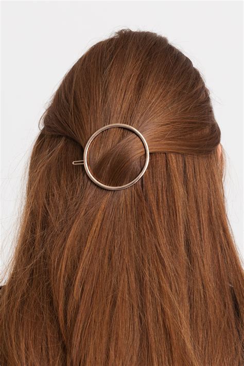 Style Your Hair with Ease Using the Magical Brass Hairpiece Securing Clip